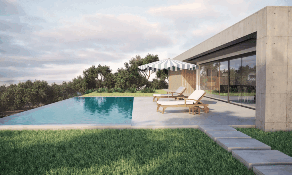 Modern house with a serene pool and lounge chairs under a large umbrella.