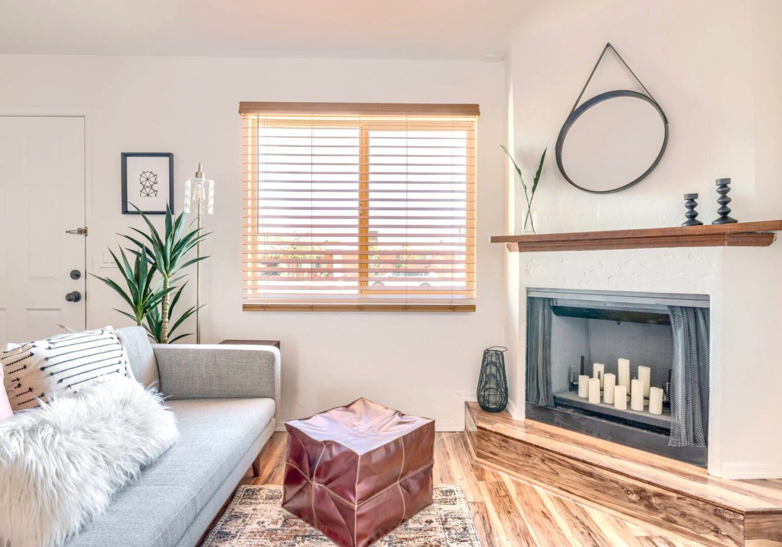 Cozy modern living room with fireplace candles